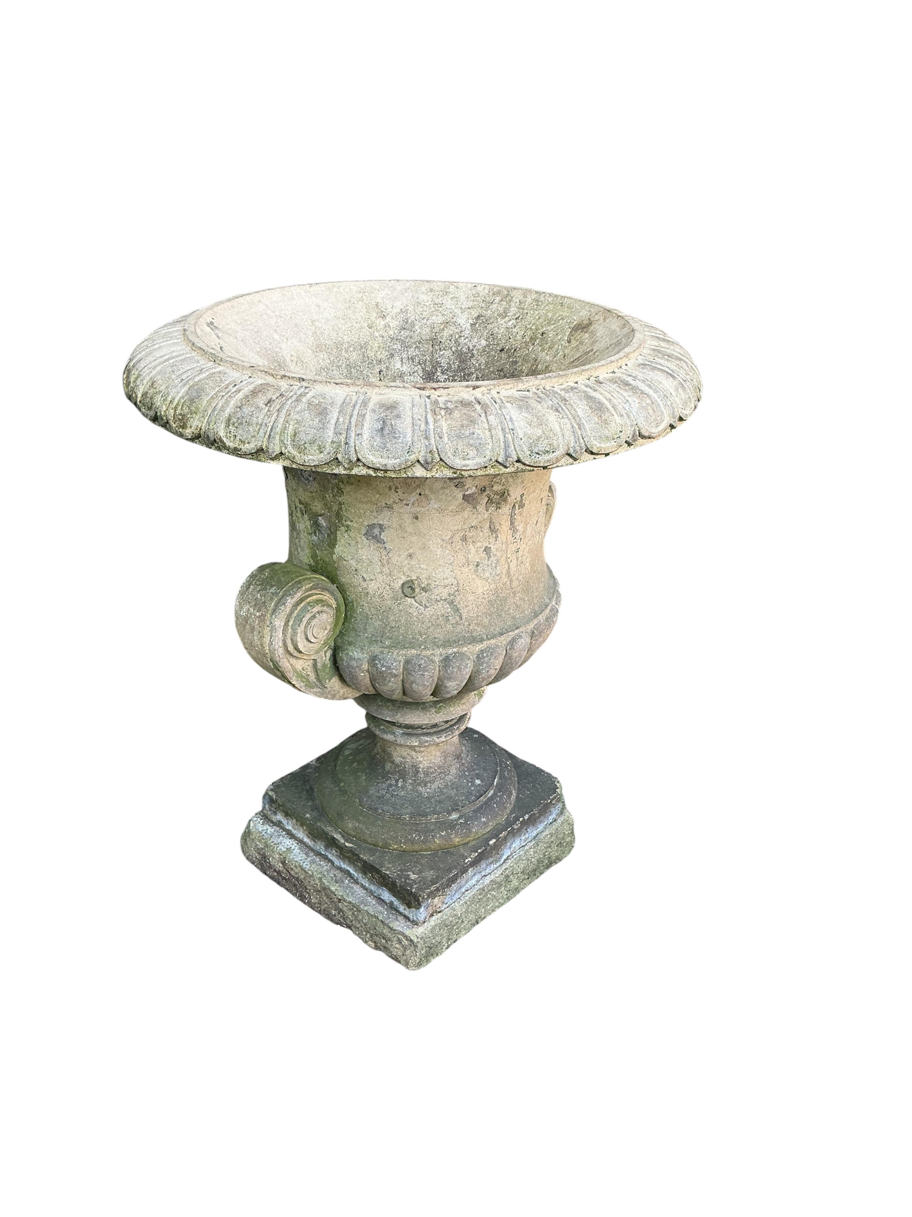A Victorian Blashfield buff terracotta campana shaped garden urn, stamped ‘Blashfield, Stamford 1870’, diameter 46cm, height 56cm